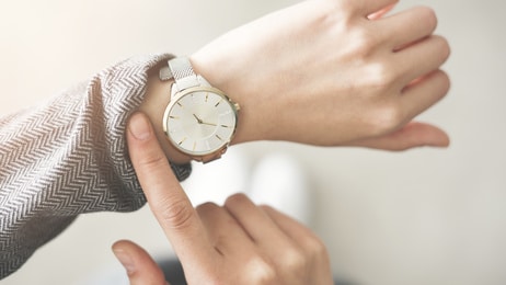 Womans arm with a watch