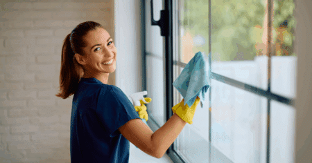 lady cleaning a window