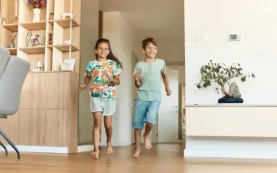 Kids playing in a tidy home after professional house cleaning service.